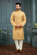 A vibrant yellow poly jacquard kurta pajama set for boys, perfect for festive occasions.
