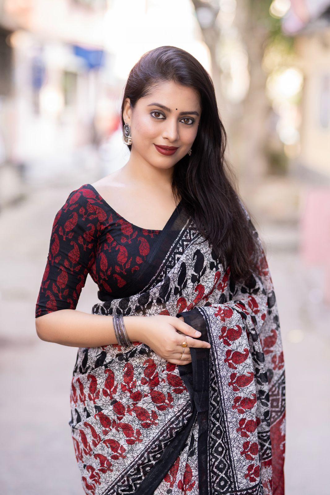 Grey Linen Blend Saree with Ethnic Motifs and Unstitched Blouse