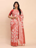 A beautiful red linen cotton saree with matching red blouse fabric draped elegantly.