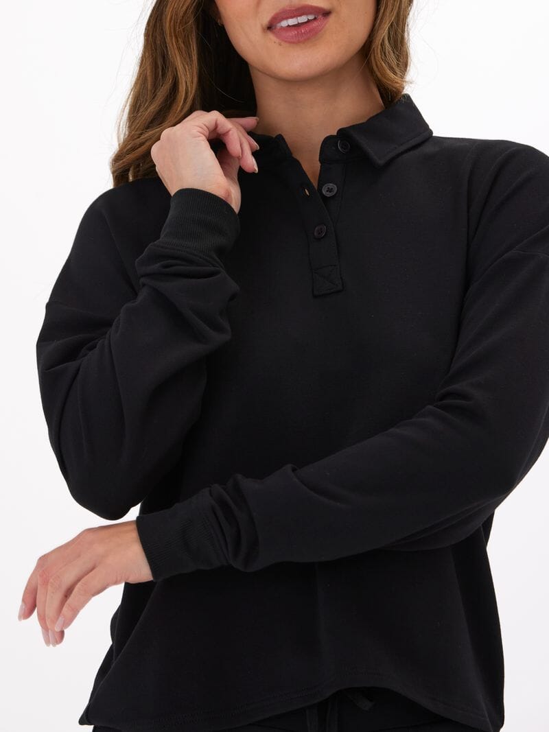 Woman wearing a relaxed-fit Eleanor Modal Terry Collared Top in a soft-touch fabric