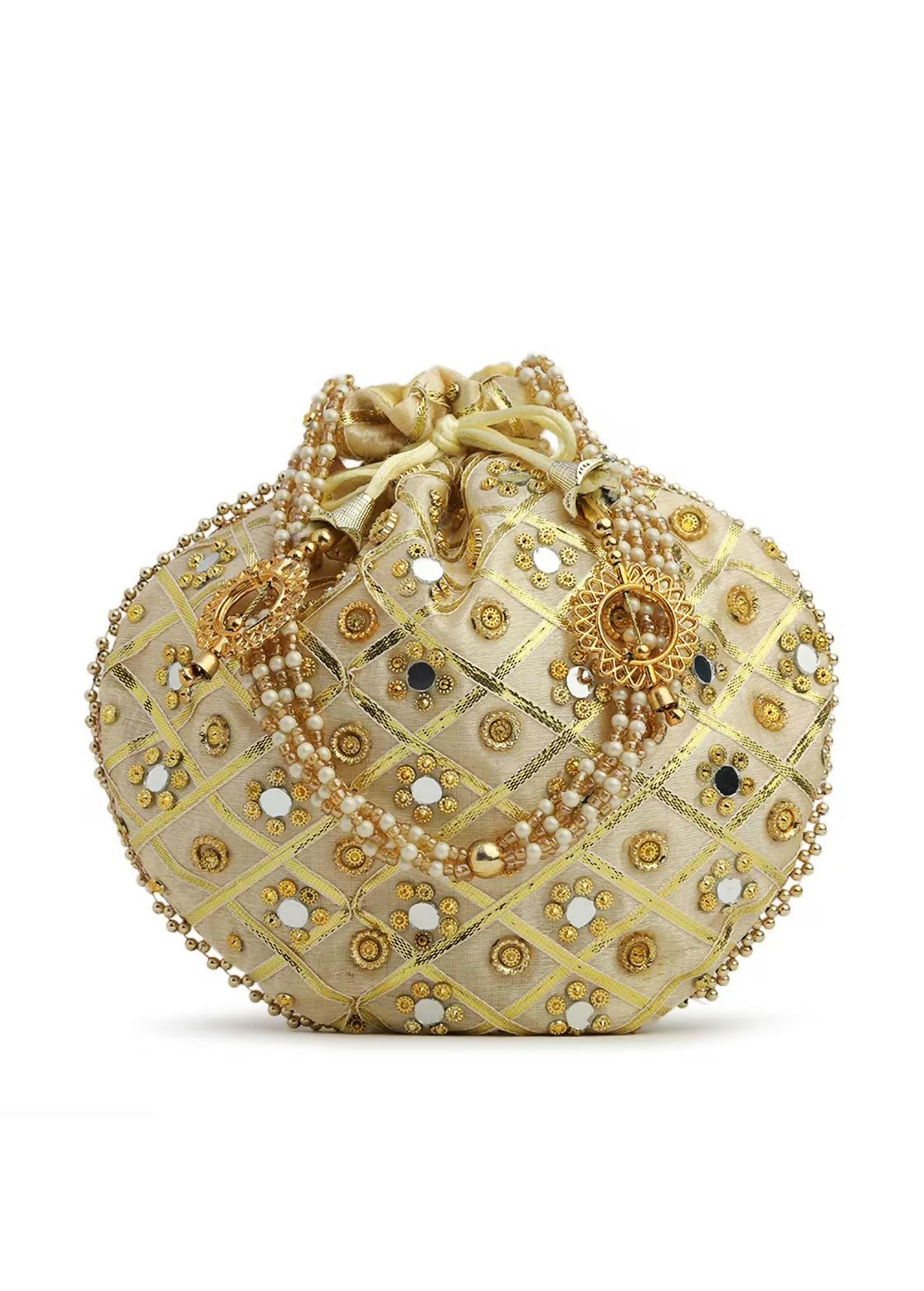 Crème embroidered potli clutch bag featuring intricate needlework for wedding and festive wear