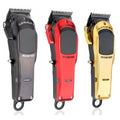 GAMMA+ Boosted professional modular clipper in matte black with interchangeable red and gold housing options.