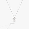 Silver Gemini zodiac pendant necklace with double-sided engraving and crystal accents.