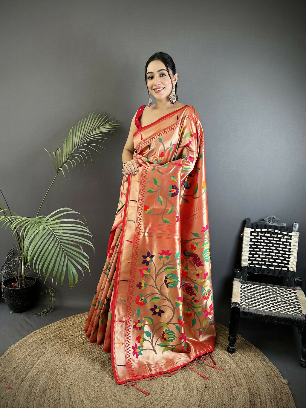 Elegant Pink Soft Silk Paithani Saree with floral and peacock motifs