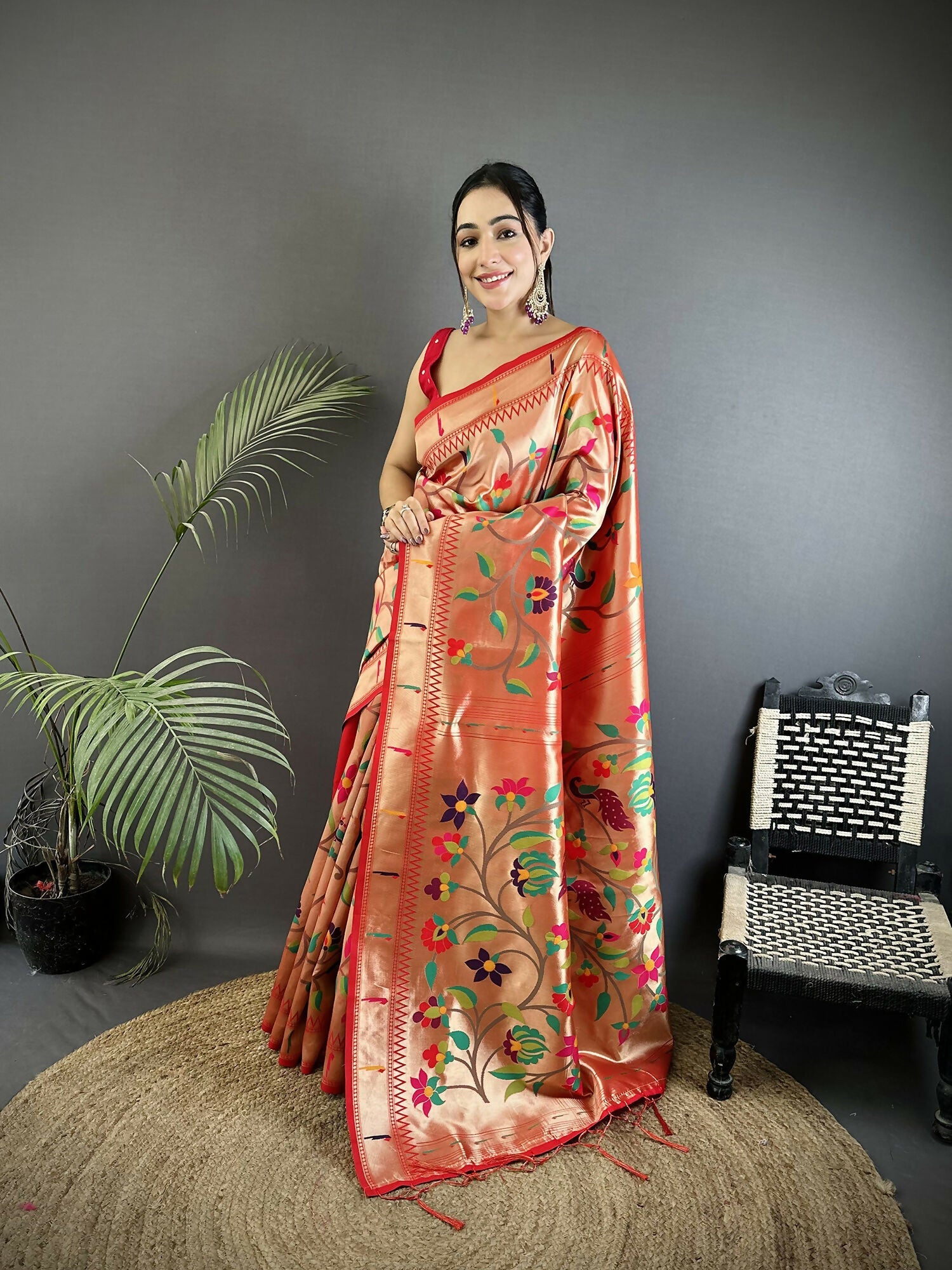Elegant Pink Soft Silk Paithani Saree with floral and peacock motifs
