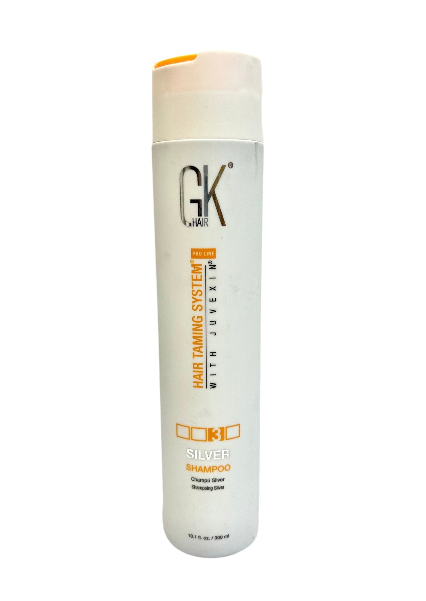 GK Hair Balancing Shampoo bottle in white and orange packaging