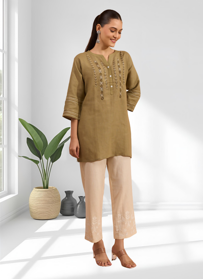 Light brown linen tunic featuring intricate embroidery and a split V-neckline