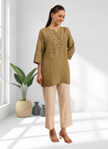Light brown linen tunic featuring intricate embroidery and a split V-neckline
