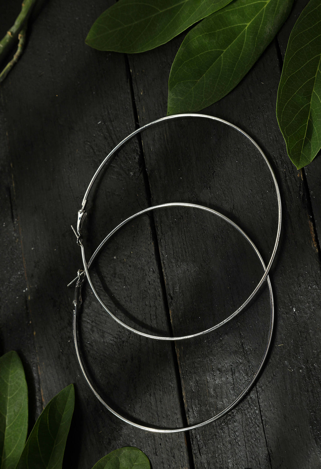 Elegant silver-plated drop earrings with an oxidized finish for women.