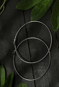 Elegant silver-plated drop earrings with an oxidized finish for women.