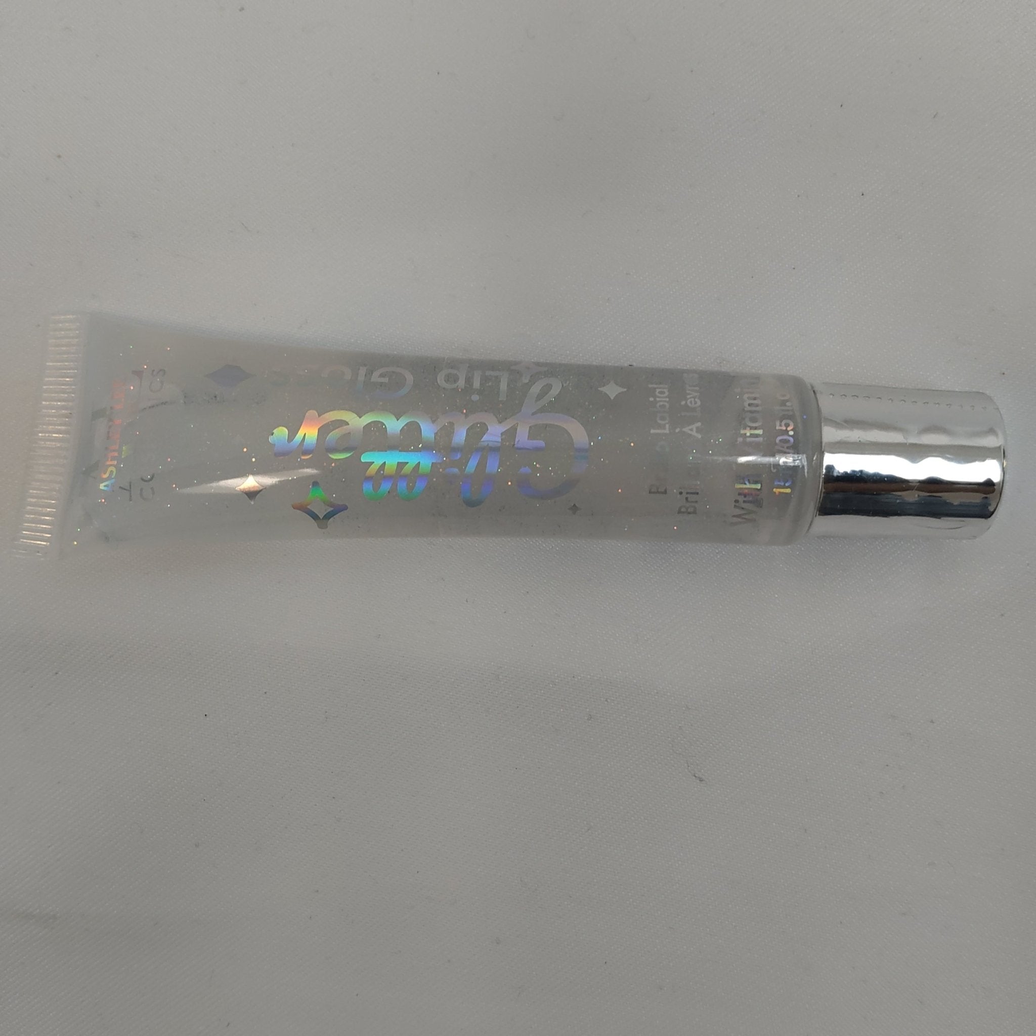 Close up of shimmering glitter lip gloss with high shine finish