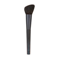 Professional Surratt sculpting brush in monochromatic black with a matte finish.