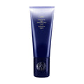 A 5 OZ bottle of Oribe Supershine Light Moisturizing Cream for hair styling