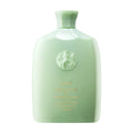 Mint-green 8.5 oz bottle of Oribe Cleansing Crème for Moisture and Control