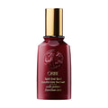 Oribe Split End Seal Beautiful Color Treatment in burgundy and gold packaging.