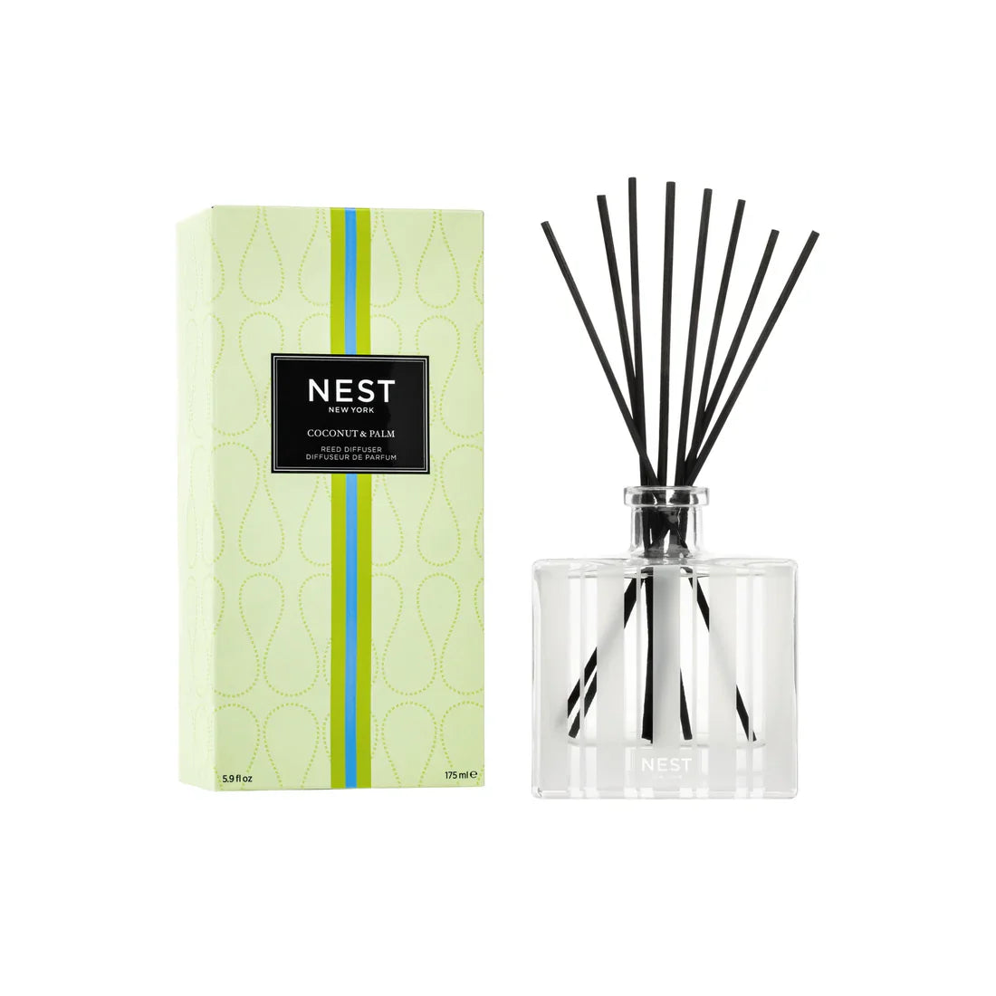 NEST New York Coconut and Palm Reed Diffuser in a geometric glass bottle with pastel green, blue, and black accents.