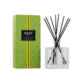 Modern 5.9 OZ glass reed diffuser with black accents and vibrant lime green packaging