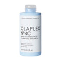 Olaplex No.4C Bond Maintenance Clarifying Shampoo bottle in light blue and white packaging.