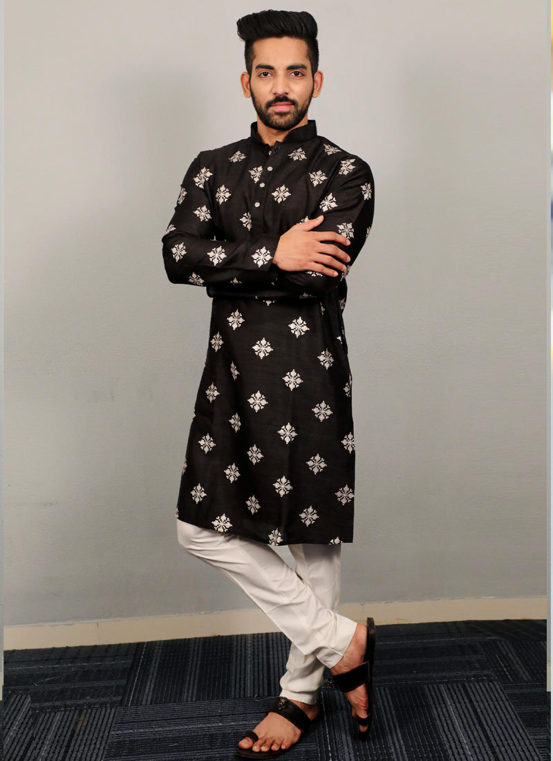 A luxurious black silk kurta decorated with elegant copper sequence embroidery.