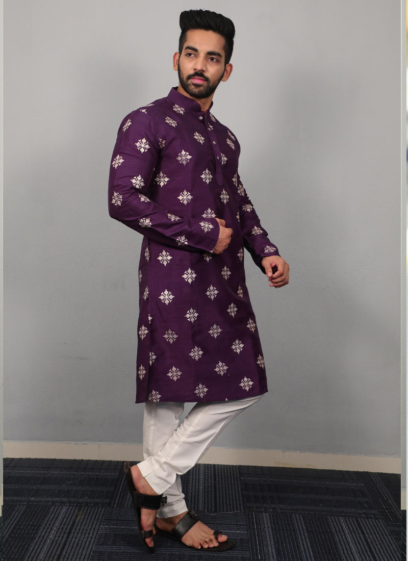 Man wearing a violet silk kurta with geometric metallic copper sequence embroidery and a button-up collar.