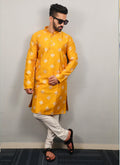 Men's yellow silk kurta with detailed copper sequins