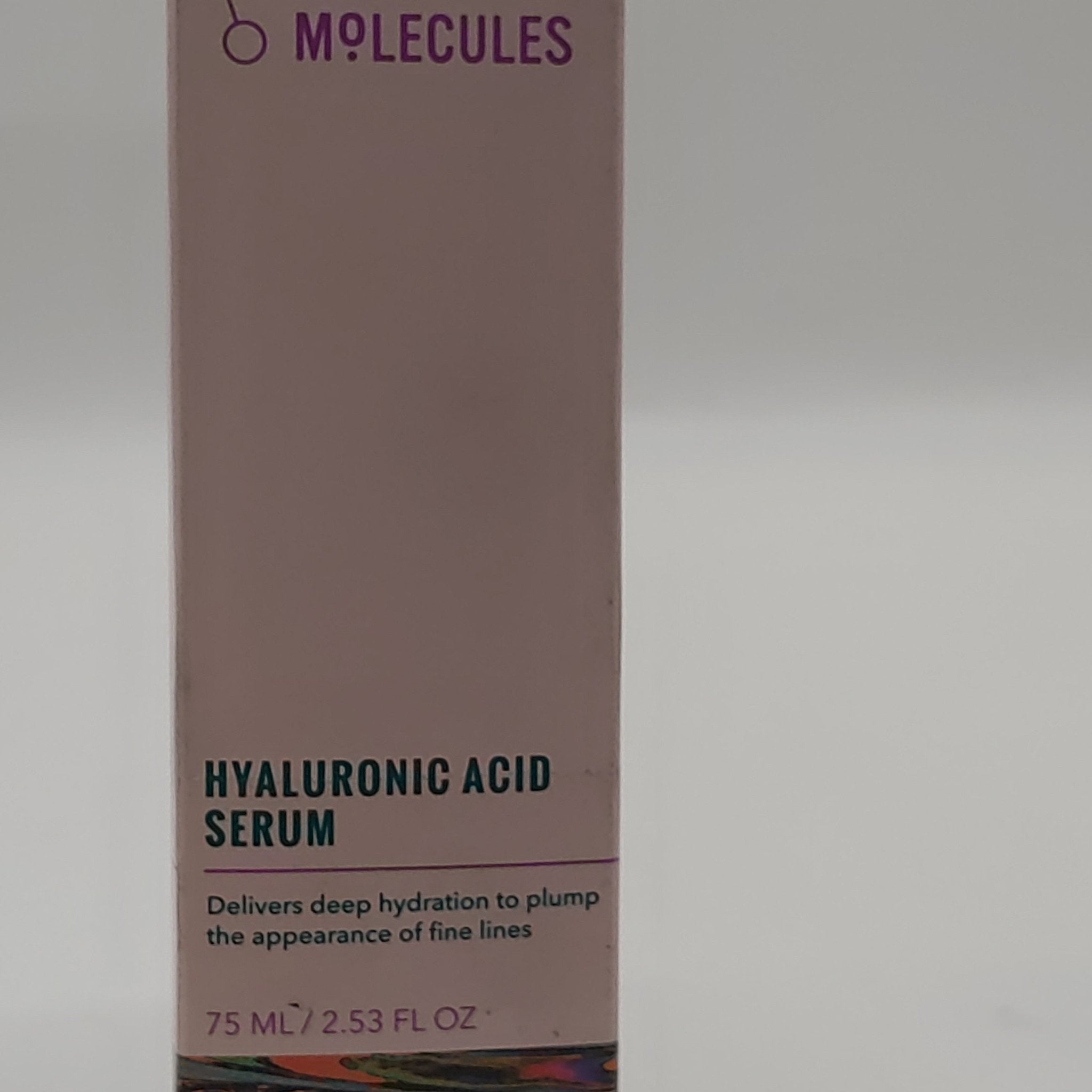 Jumbo size white and purple bottle of Good Molecules Hyaluronic Acid Serum.