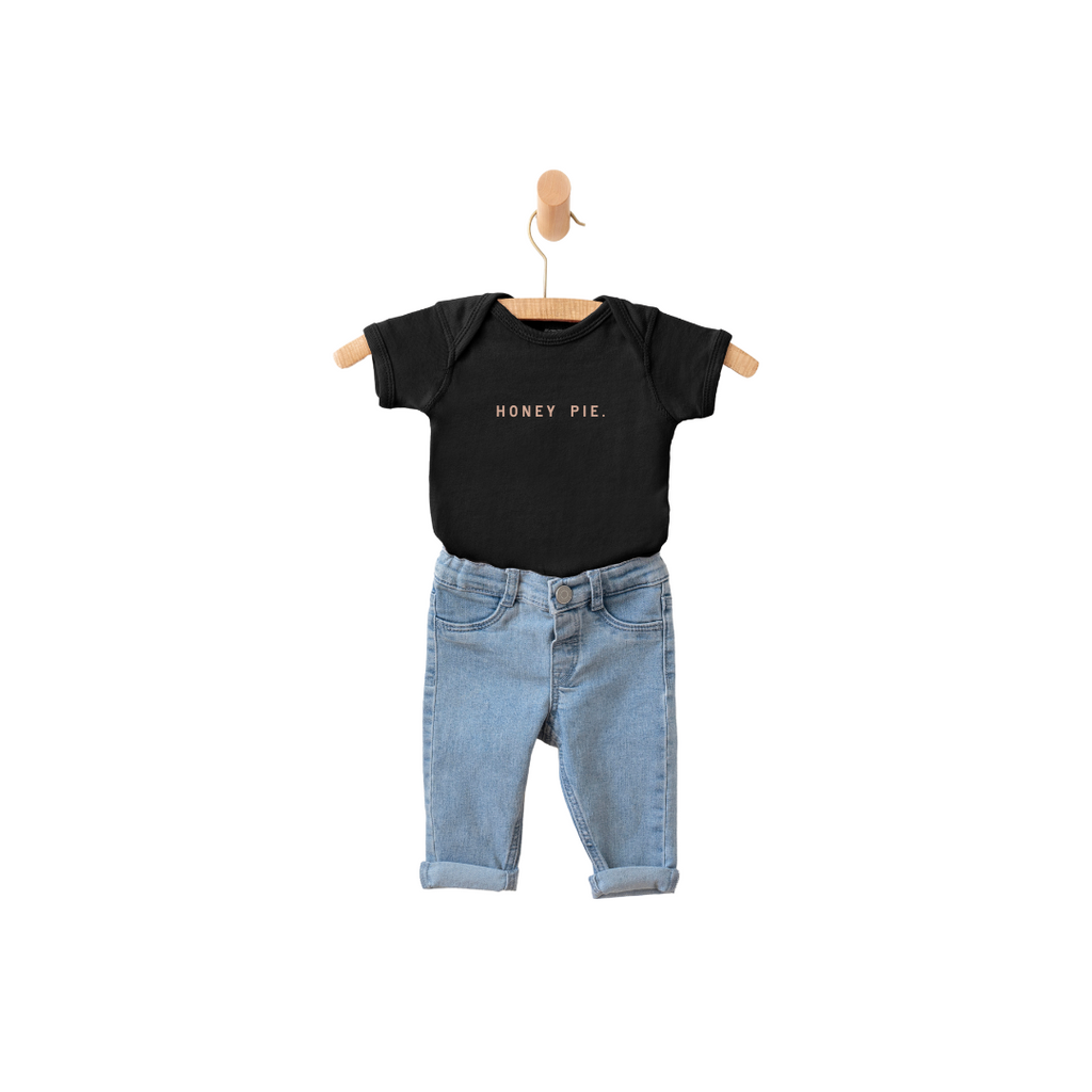Minimalist Honey Pie graphic onesie in black and white cotton