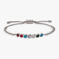 Adjustable bolo bracelet featuring a colorful row of Garnet, Ruby, Aquamarine, Pearl, Diamond, and Malachite stones.