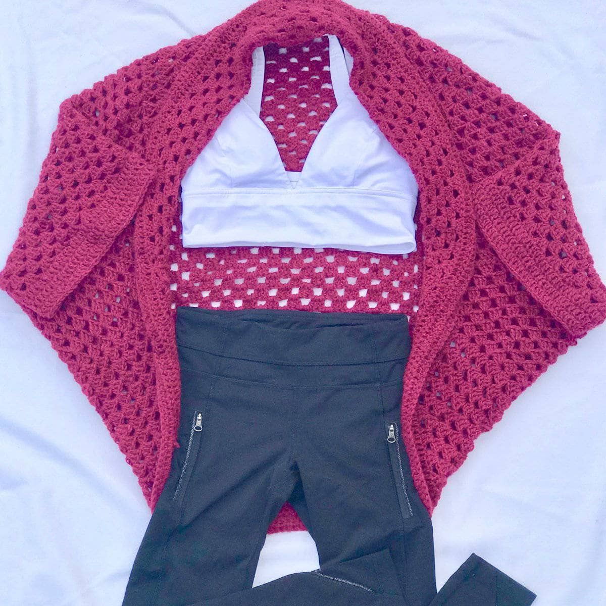 A cozy, finished granny square crochet cardigan made from soft yak wool yarn.