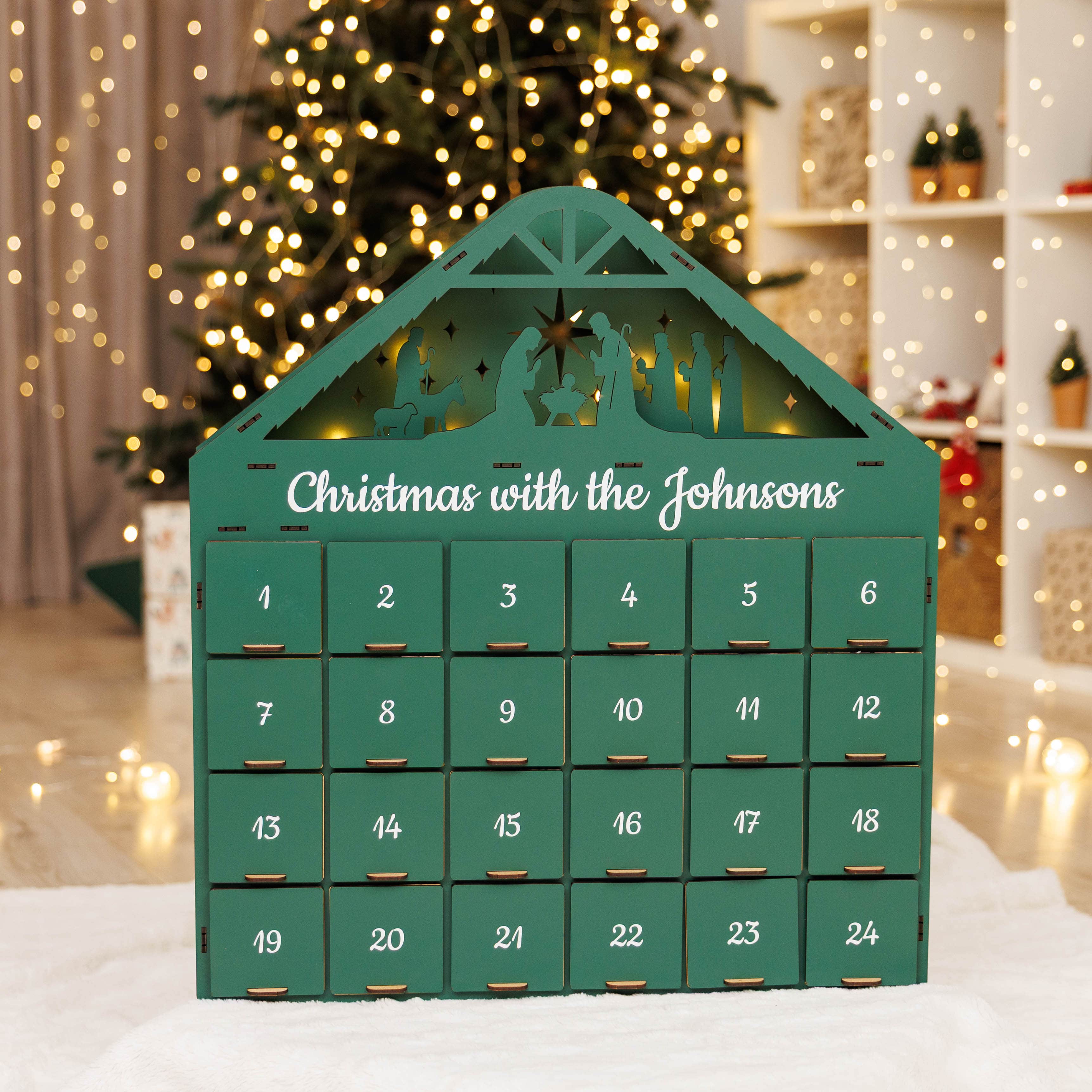 Green wooden Christmas advent calendar with 24 drawers for holiday countdown