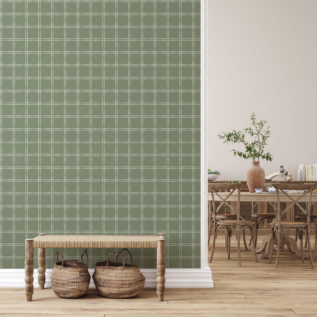 Warner plaid wallpaper in sage green, dusty rose, and beige, displayed in a modern farmhouse interior.