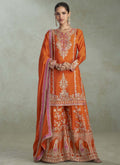 Elegant orange Chinon palazzo suit with detailed gold Gota Patti embroidery and matching wide-leg trousers