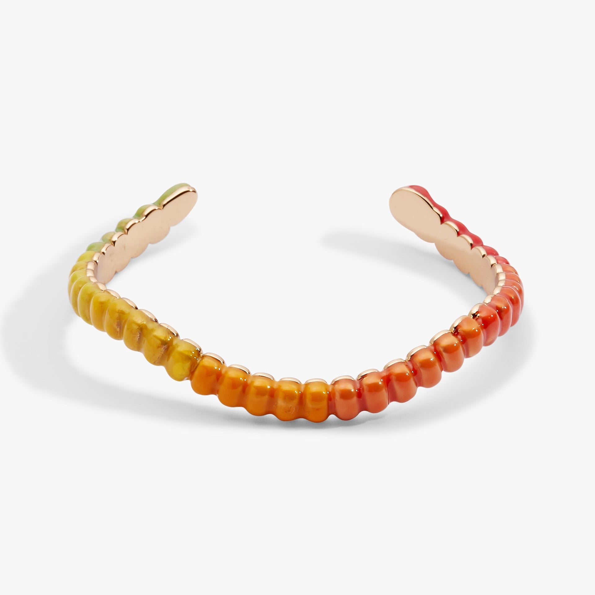 Multicolored resin cuff bracelet designed to look like a gummy worm in yellow, orange, red, and green.