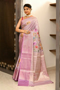 Lavender Banarasi silk saree with detailed mirror work and applique borders