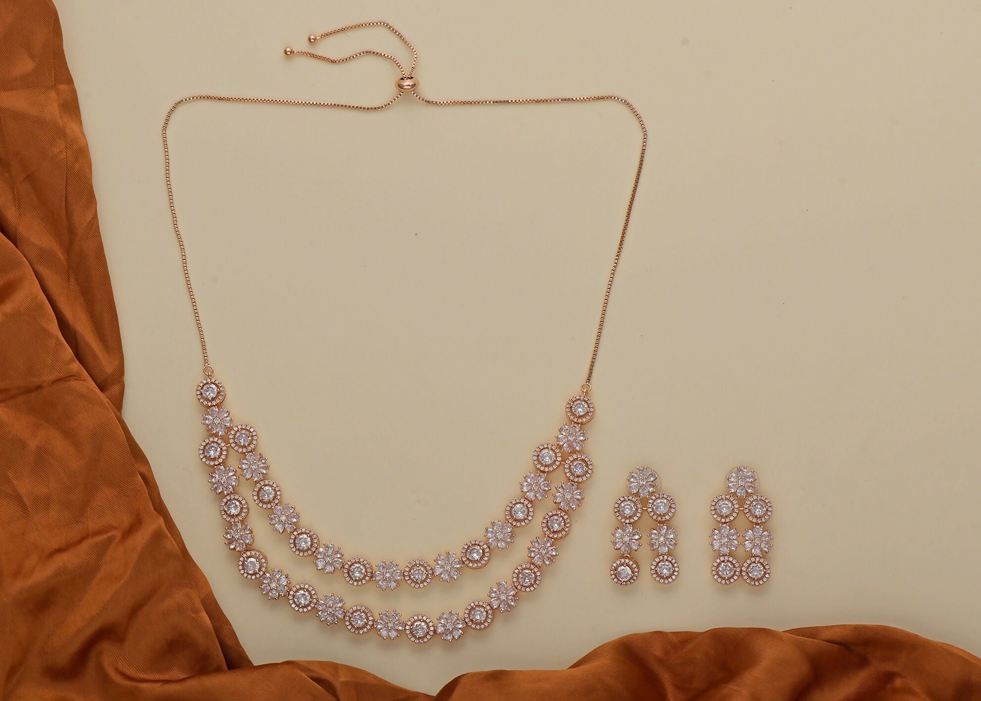 Golden White AD stone necklace set made from premium brass