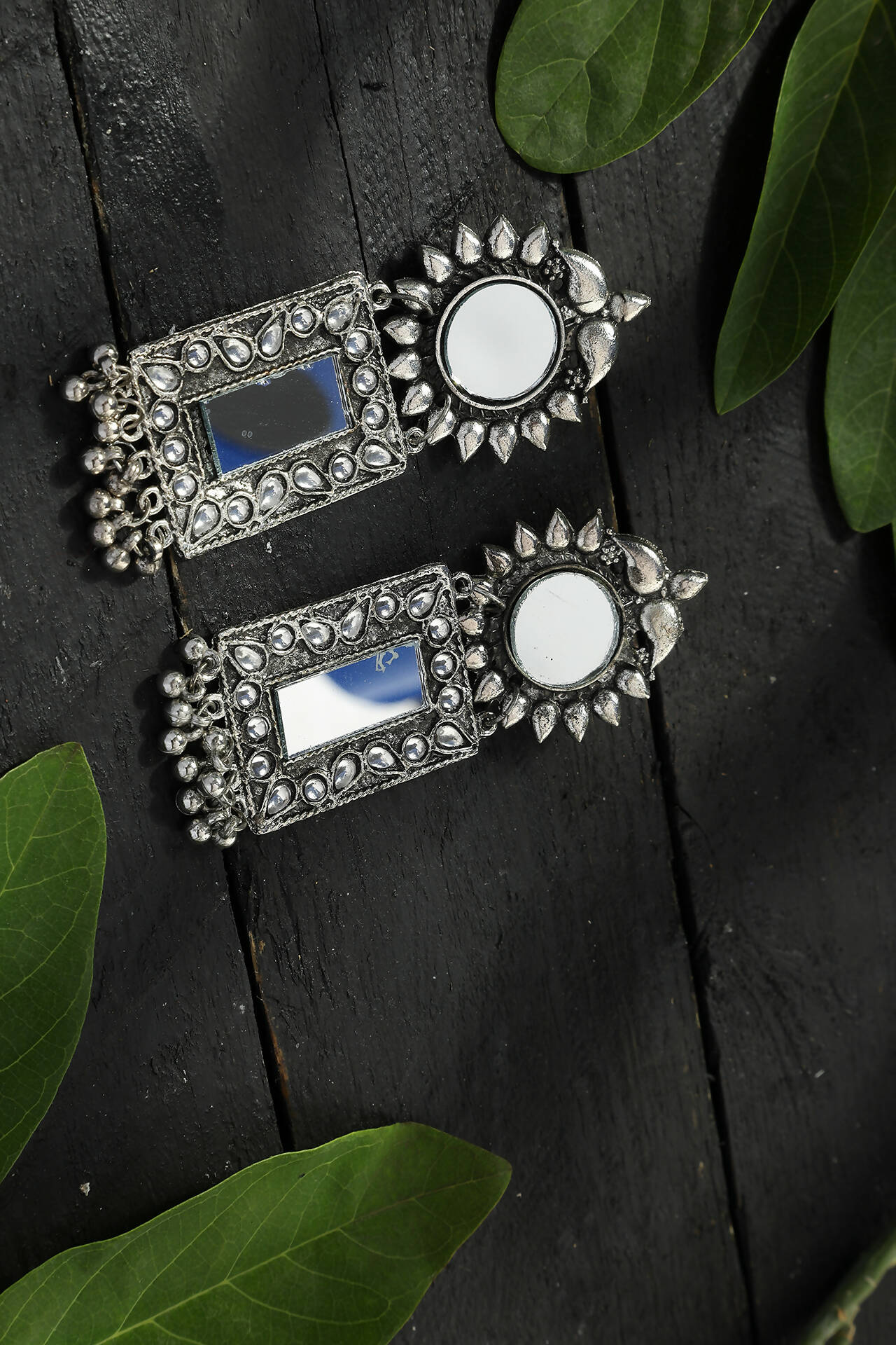 Silver-plated mirror design drop earrings with oxidized finish