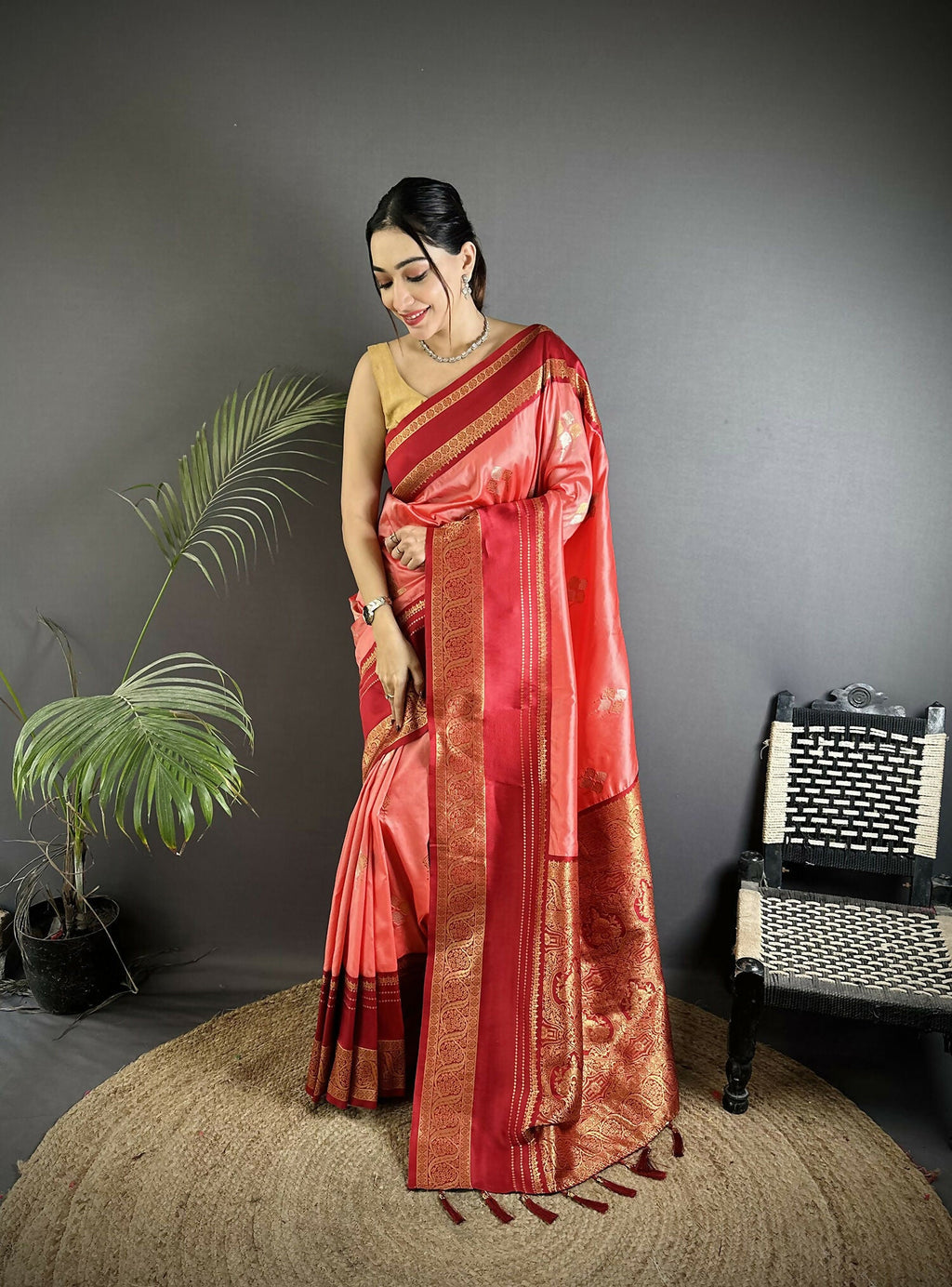 Salmon pink Banarasi soft silk saree with sophisticated woven textures