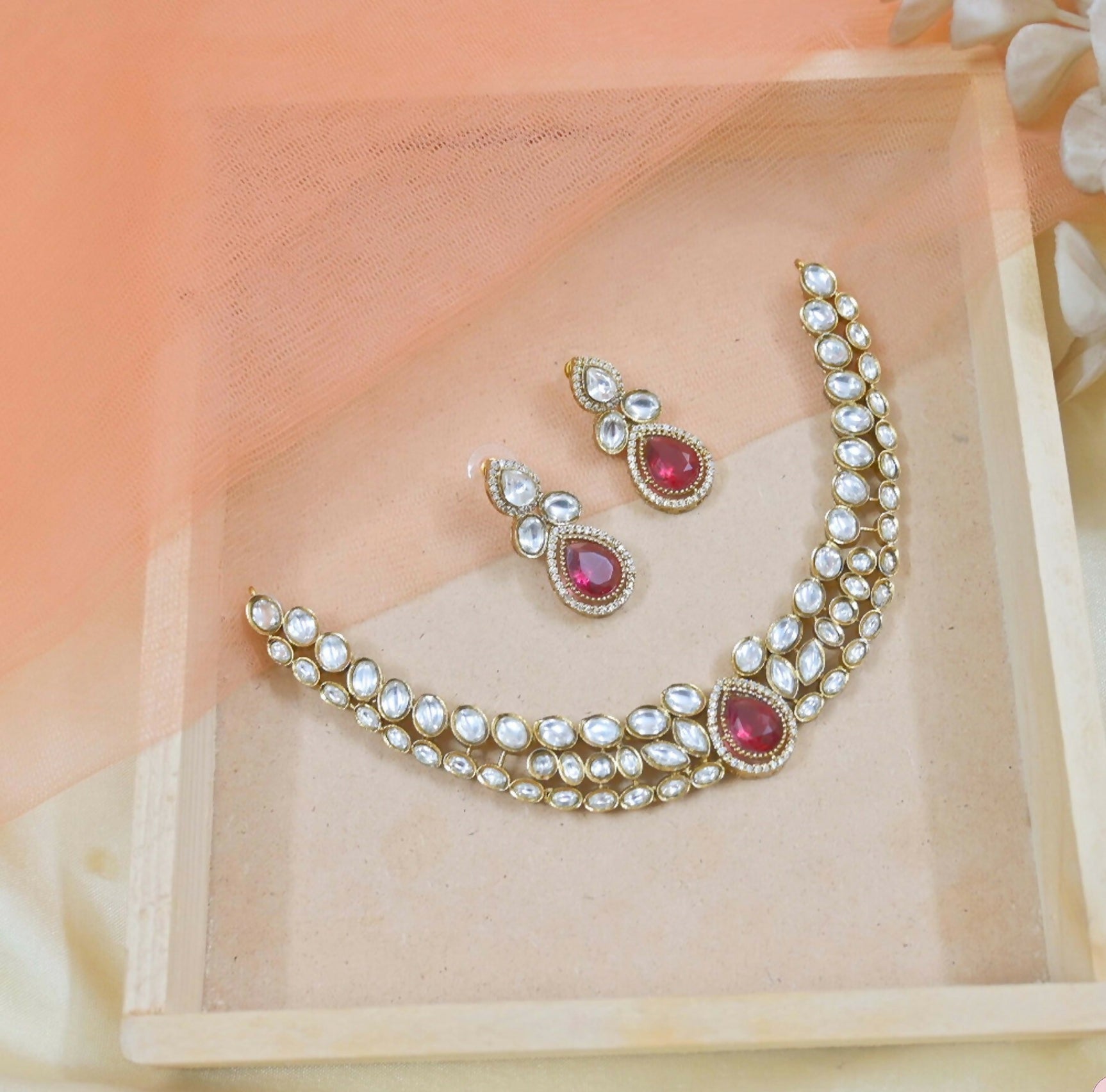 Stunning pink Moissanite necklace set featuring a sophisticated copper base