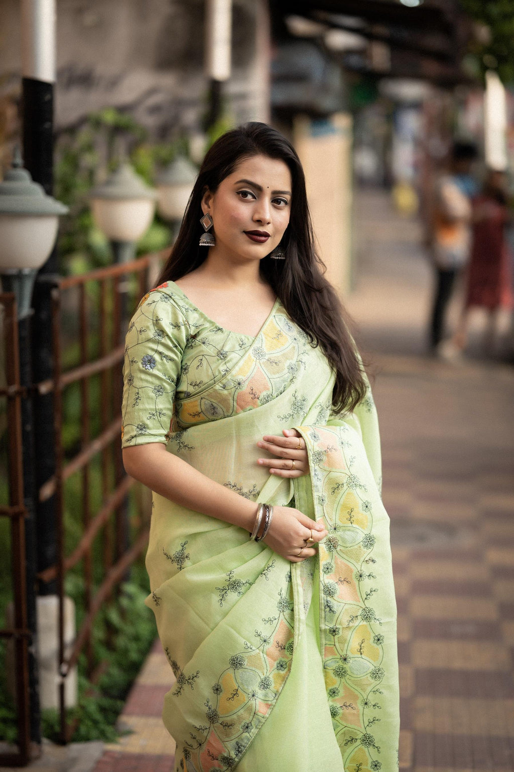 Green pure linen saree with pencil stitch embroidery and heavy phantom silk blouse