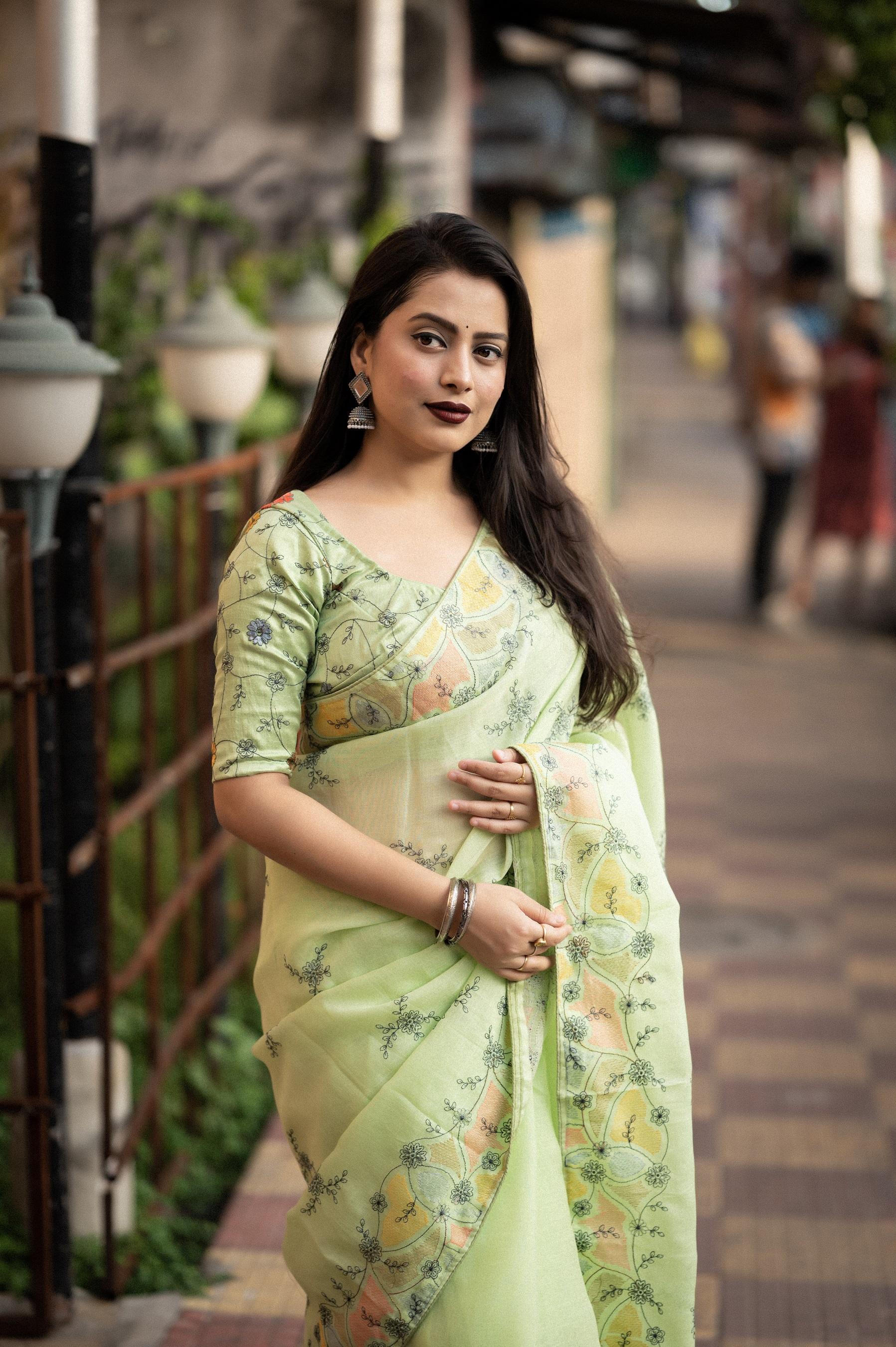 Green pure linen saree with pencil stitch embroidery and heavy phantom silk blouse