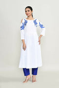 Elegant white rayon tunic for women with detailed embroidery design