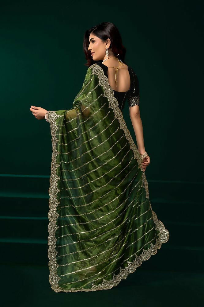 Green Net Party Wear Saree with Black Velvet Blouse