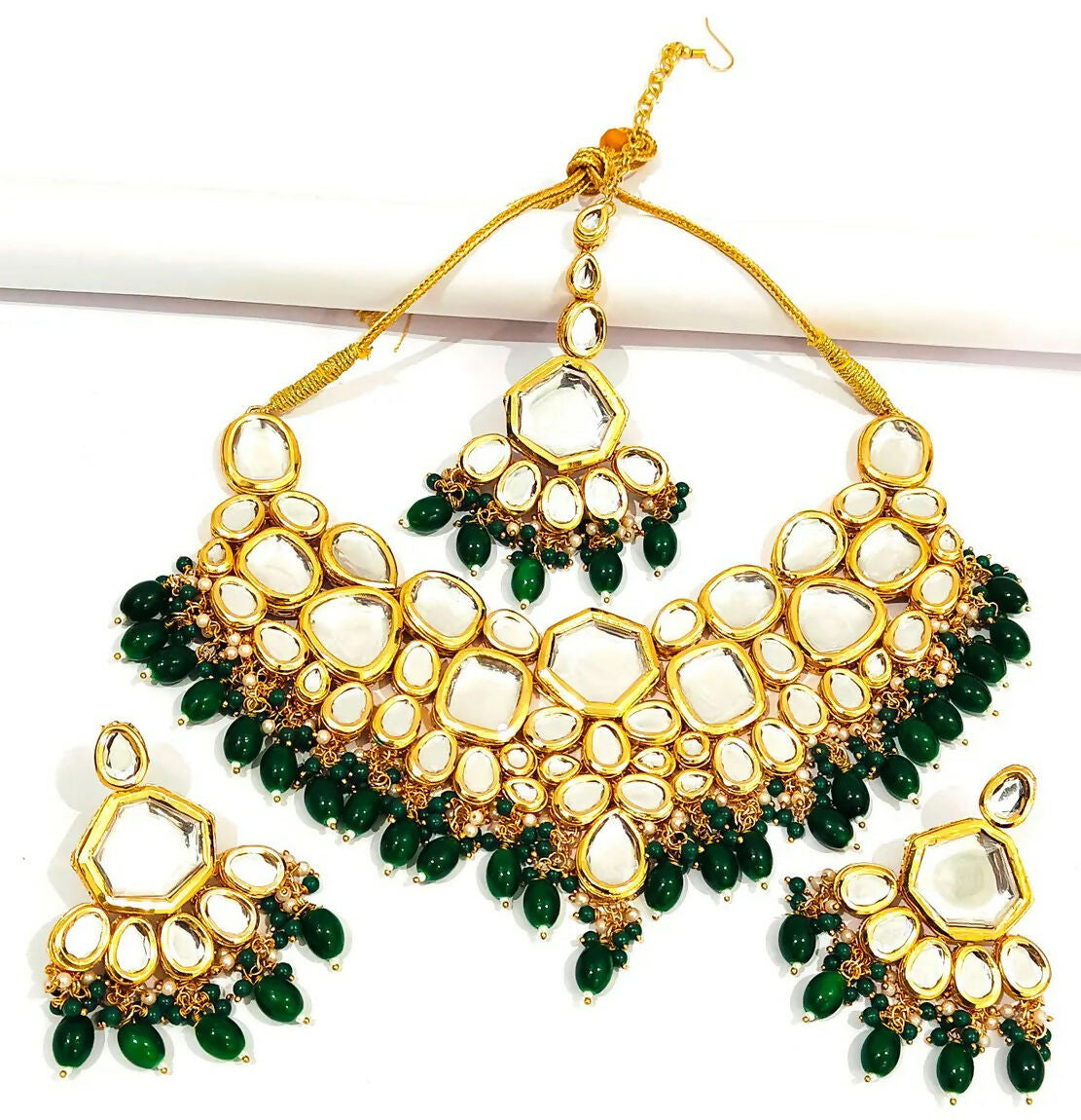 Luxury Kundan stone studded gold plated jewelry set for ethnic wear