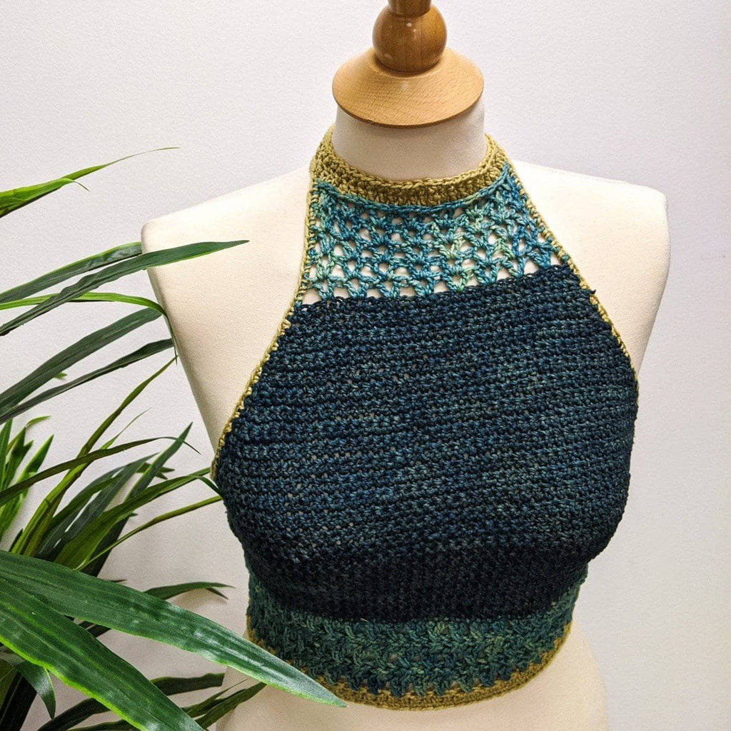 A close-up of a handmade crochet halter top bralette with an easy, beginner-friendly texture.