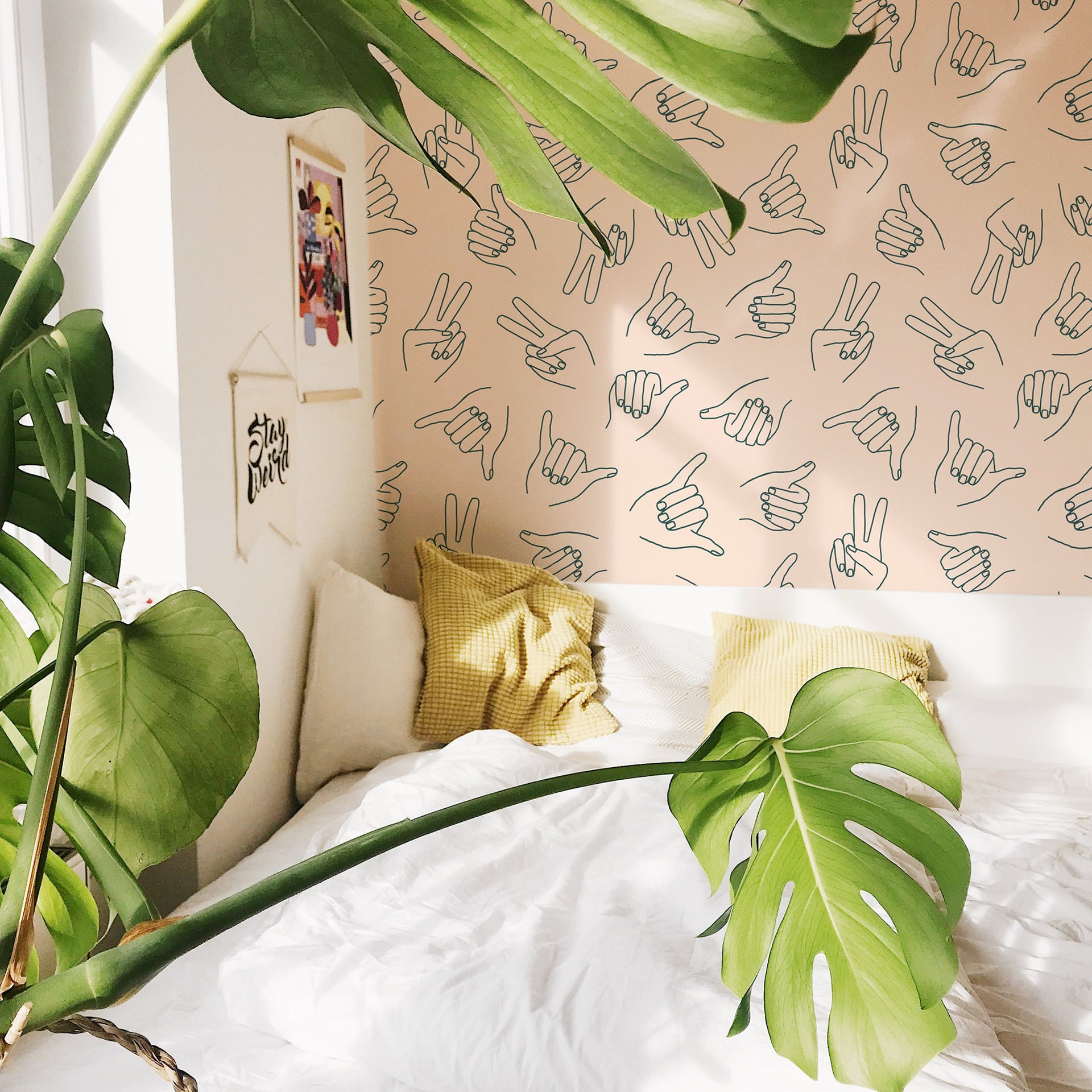 Modern bohemian wallpaper featuring peach and dark-grey abstract patterns.