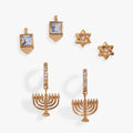 Hanukkah stud earring set featuring a clear crystal Star of David and an aquamarine crystal Dreidel.