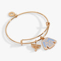 Gold-plated Hanukkah bangle with Let's Get Lit sweater and menorah charms