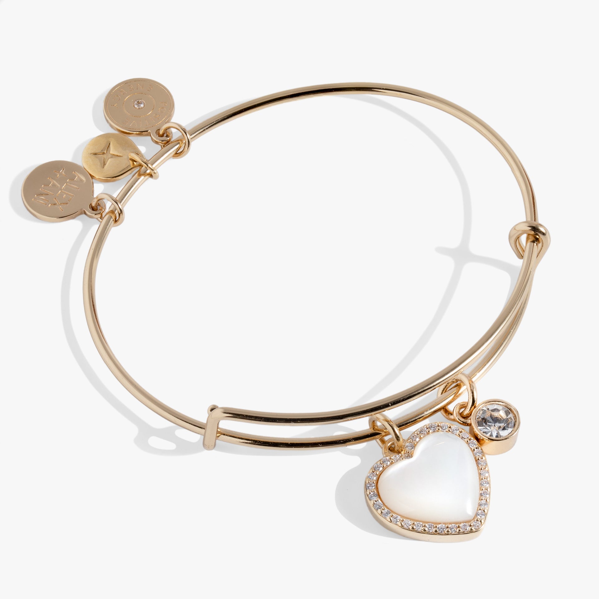 Mother of Pearl heart charm anniversary bangle with crystal accents on an expandable wire.