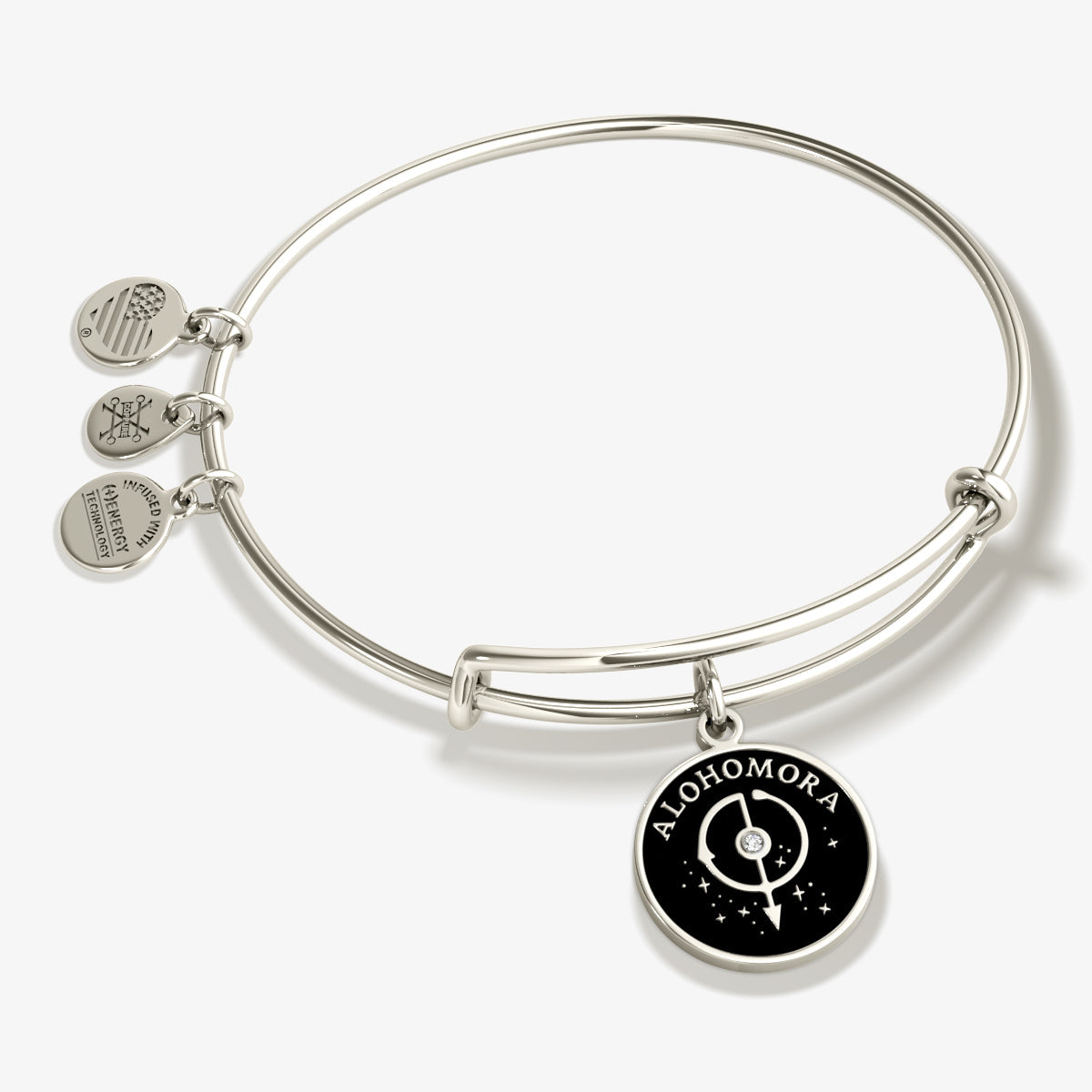 Harry Potter Alohomora charm bangle featuring a detailed spell-themed charm.