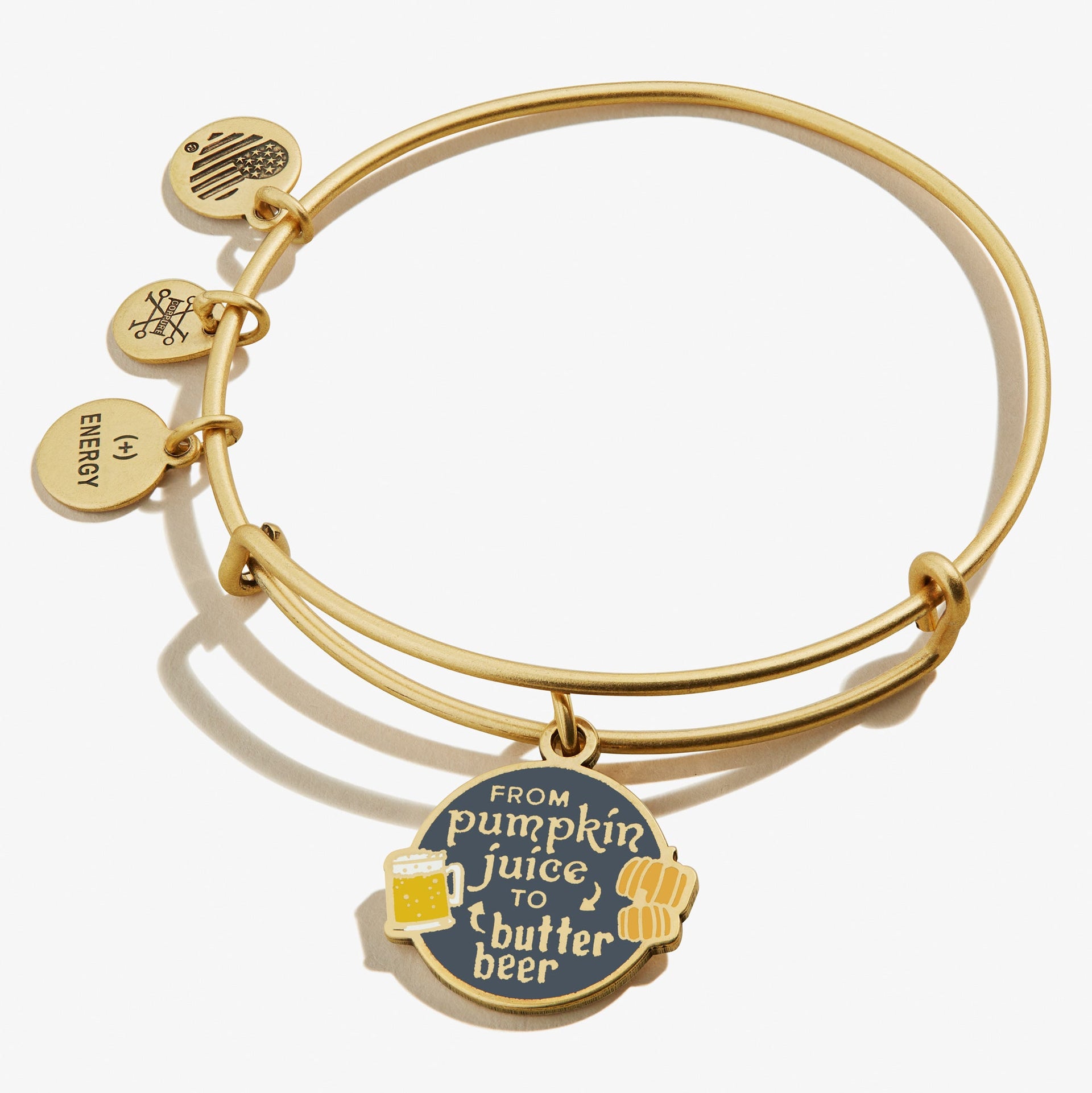 Harry Potter themed charm bangle featuring gold, navy, and yellow accents with 'From Pumpkin Juice To Butter Beer' text.